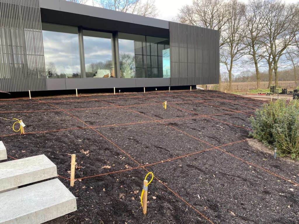 raster over border om planten goed uit te kunnen zetten
